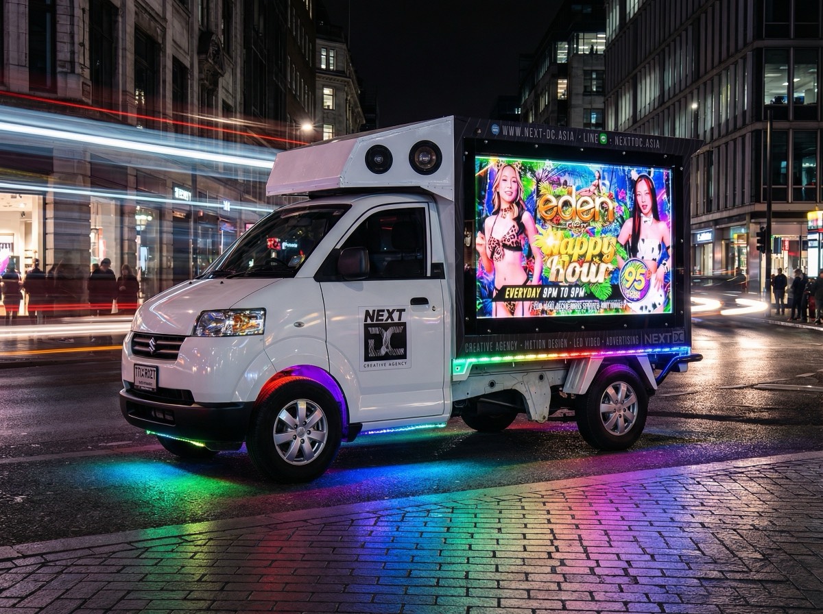 NEXT DC Video Truck with giant screens and RGB underglow cruising Pattaya at night